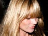 Kate Moss' fringe looks natural and slightly uncomfortable