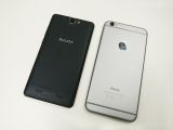 Bluboo X550 compared to iPhone 6 Plus, back view