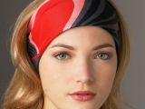 Black/pink/red Emilio Pucci scarf worn as head band