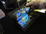 OLED display that can fold into three