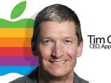 Tim Cook with old (rainbow) Apple logo