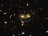 Creepy smiley face in space is actually a galaxy cluster