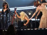 Christina Aguilera takes a tumble onstage