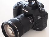 Canon EOS 7D Mark II with lens and flash