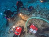 Underwater researchers exploring the ship's remains