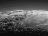 A closer look at Pluto's mountains and frozen plains