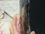 The image shows clear burns on the Note 7