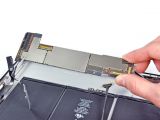 iPad 2 logic board keeps all its chips well hidden behind what appears to be a metal crafted foil