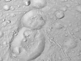 Craters on Enceladus kind of look like a snowman