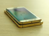 Samsung Galaxy Note5 and S6 edge+ in gold, on top of each other