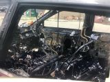 What the car looks like after the phone set it on fire