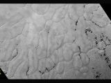 Icy, craterless plains on Pluto