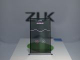 ZUK smartphone prototype with transparent display, playing music